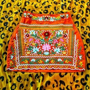 Small orange embroidered skirt
